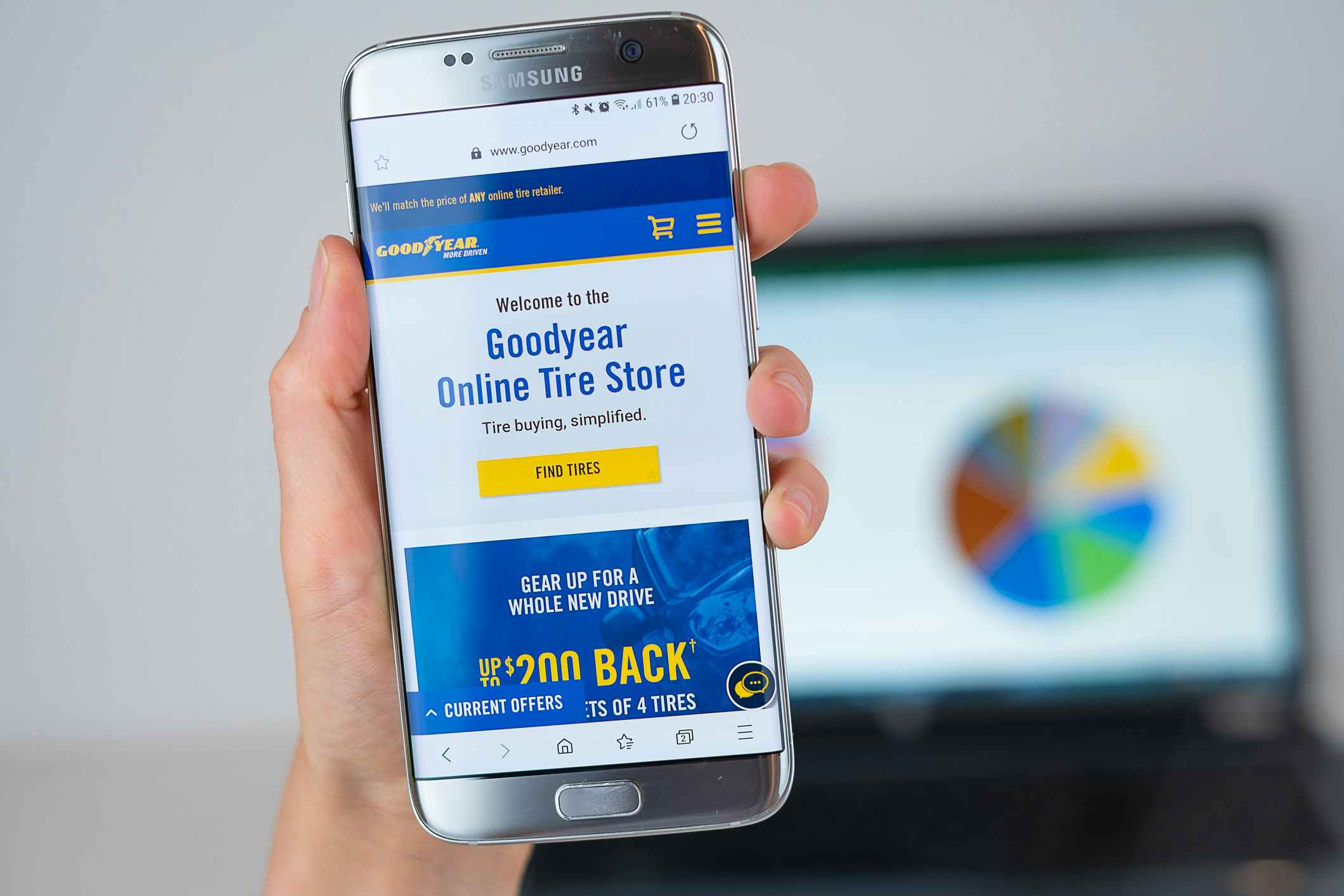 Goodyear web site on mobile phone screen. Mobile version of Goodyear company web page on smartphone.