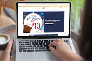a person looking at the build a bear black friday website on their macbook