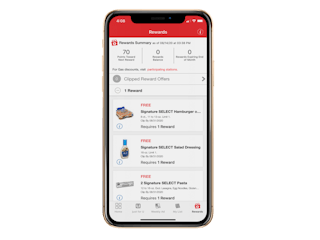 phone showing vons freebies like hamburger buns and salad dressing