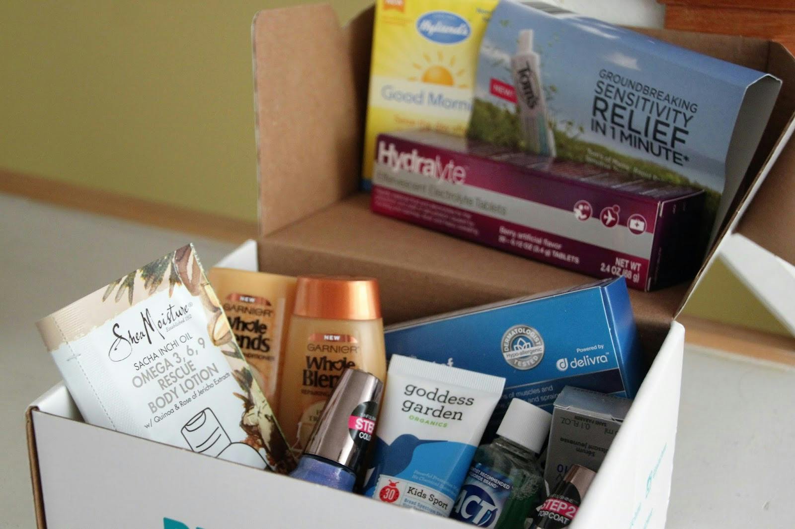 PINCHme box filled with samples of beauty products. 