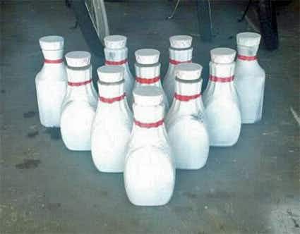 Bowling pins made out of plastic bottles.