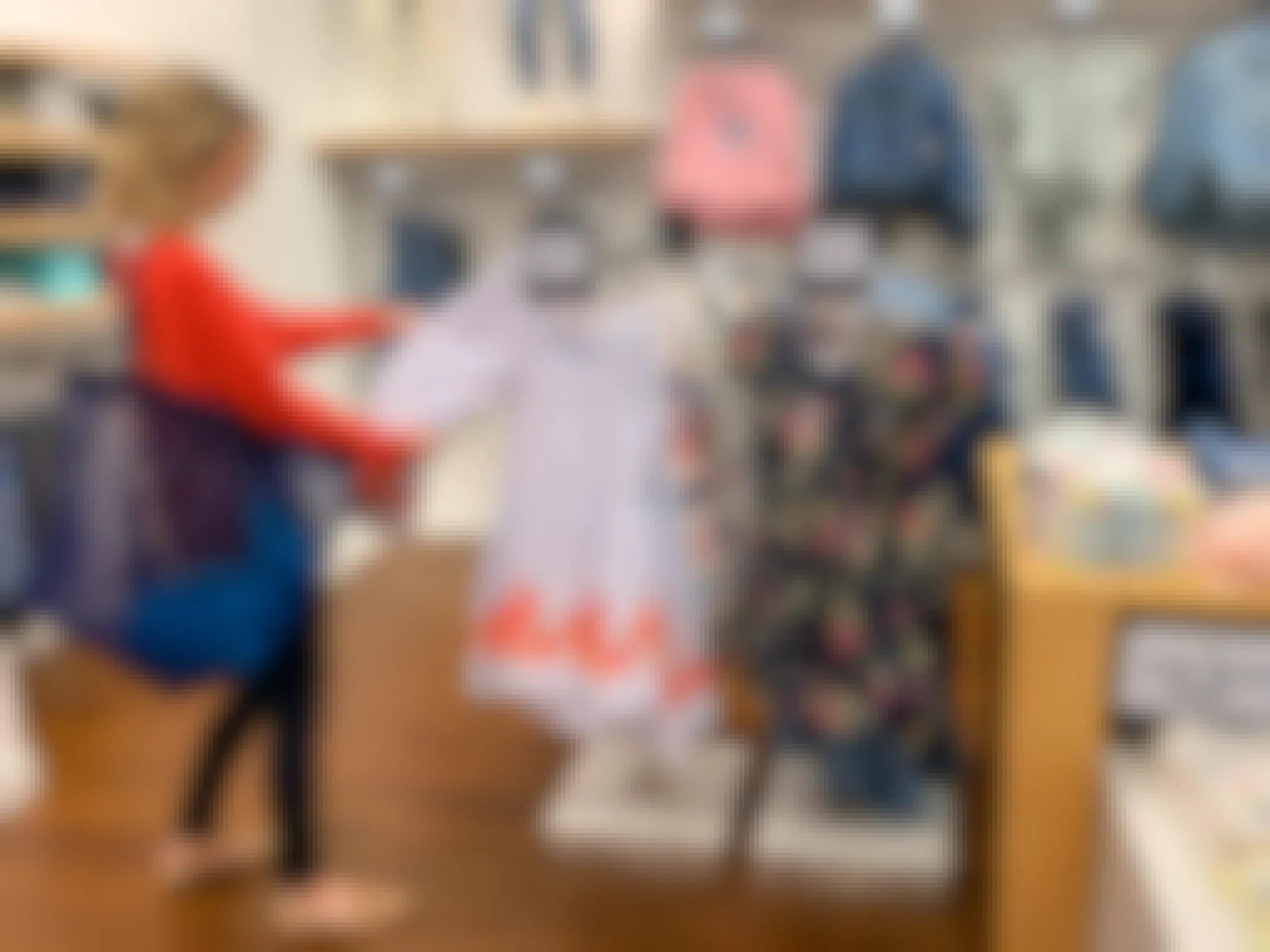 A woman shopping in a GAP store