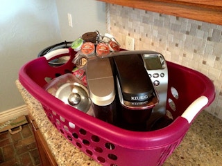 pack immediate-use items in a laundry basket