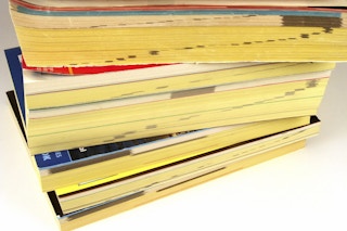 Use phone book pages when moving and packing