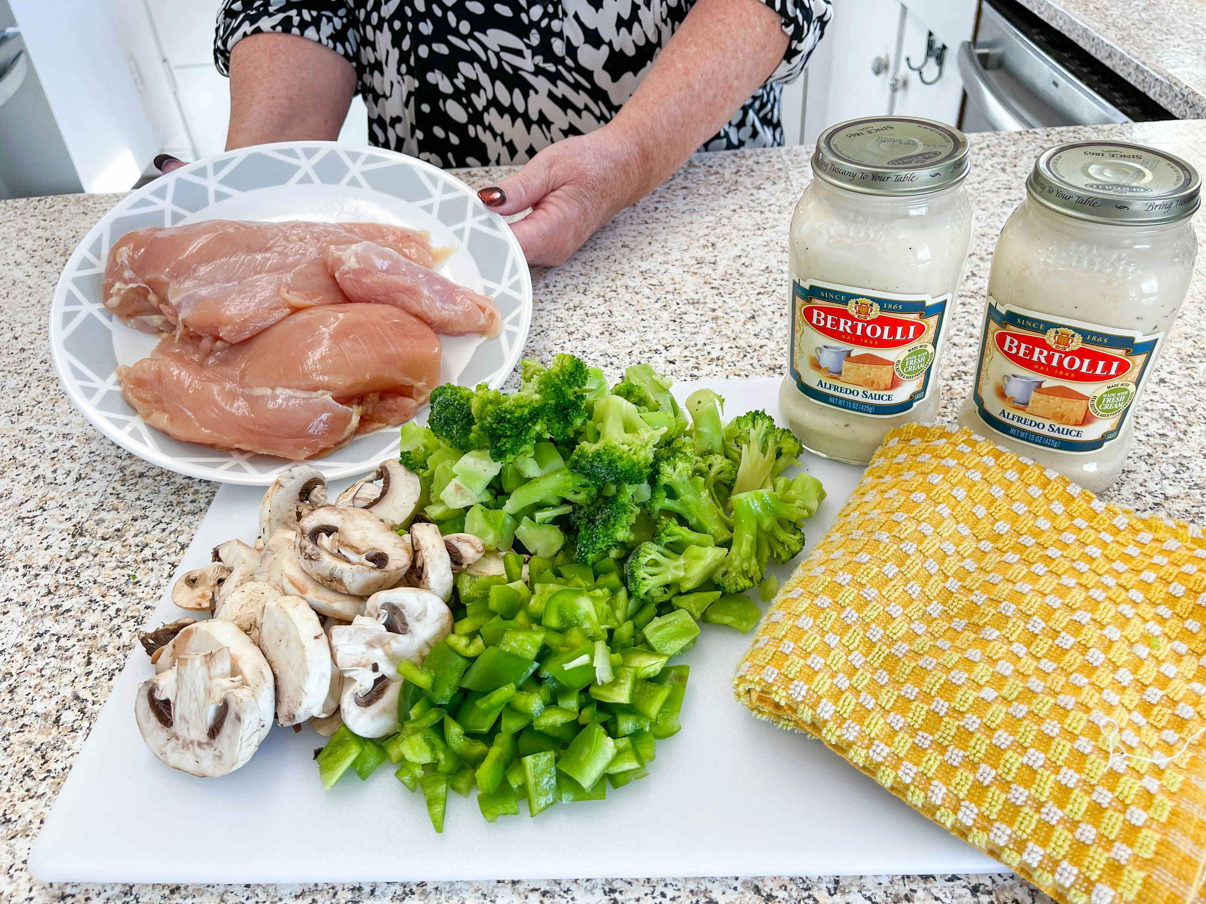 woman preparing ingredients fora freezer meal 