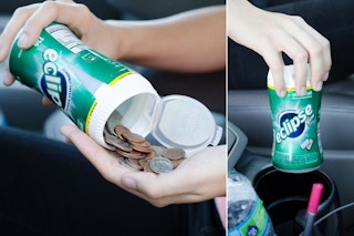 A person pouring out change from an Eclipse gum container.