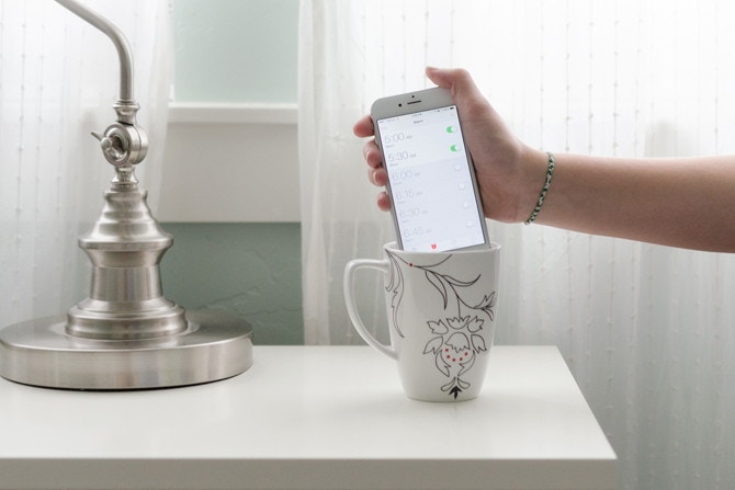 Stick your phone in a cup or ice bucket to amplify sound in a hotel room.