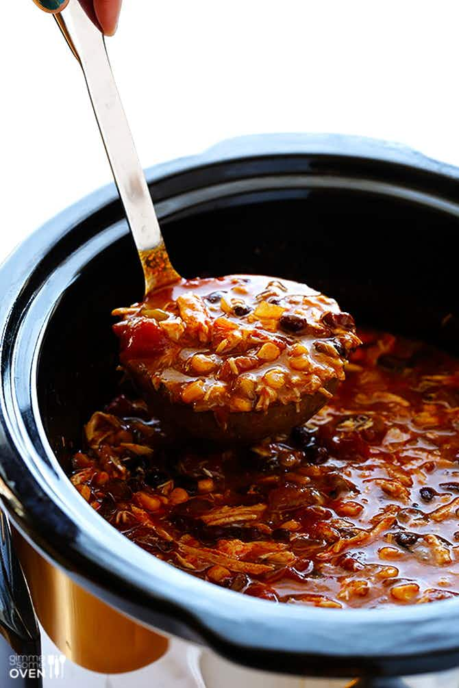 A slow cooker filled with chunky enchilada soup