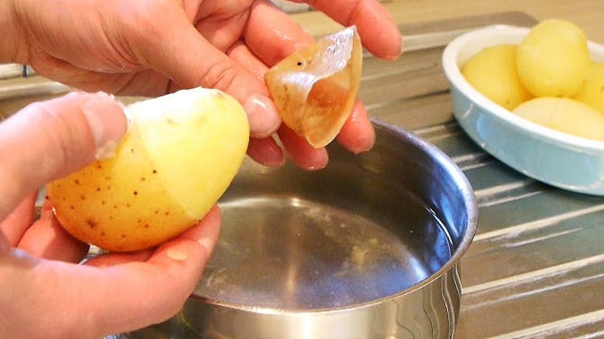 Peel potatoes easily by boiling them whole on Thanksgiving