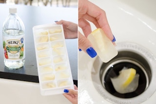 Frozen cubes of vinegar with lemon slices being placed in a drain