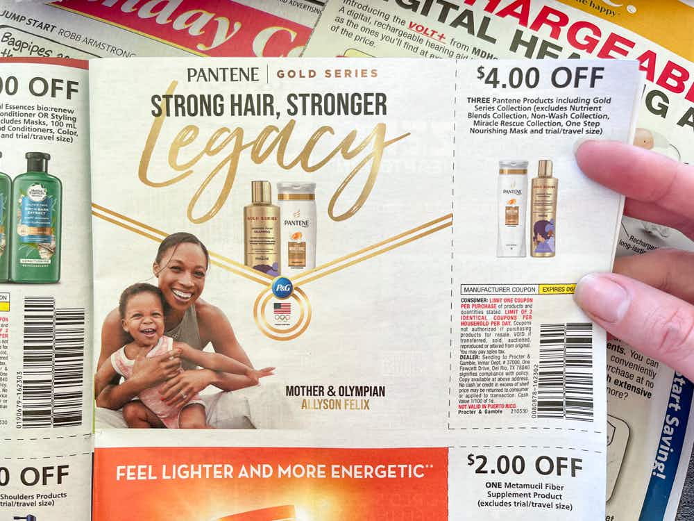A newspaper coupon for four dollars off Pantene products