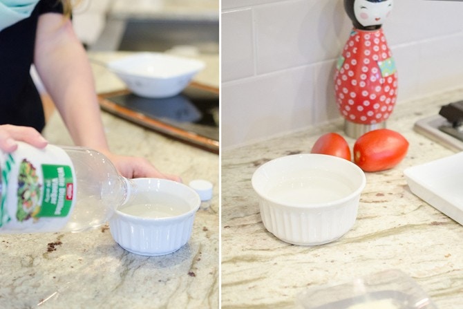Person pouring vinegar into a ramekin 