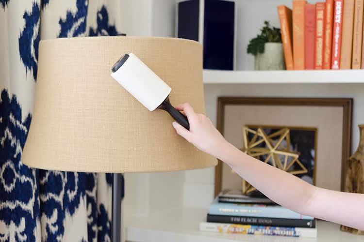 Use a lint remover to dust lampshades and fabric surfaces