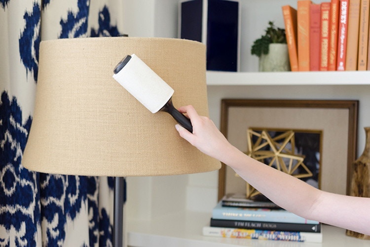 Use a lint remover to dust lampshades and fabric surfaces