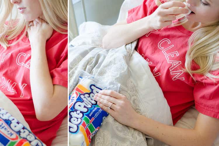 person with sore throat in bed eating marshmallows