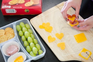 Use cookie cutters to make fun shapes out of cheese, tortillas, and sandwiches in school lunches.