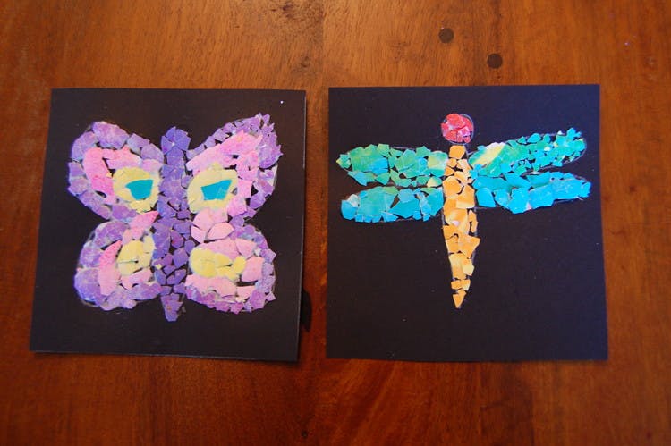 Eggshell mosaics of a butterfly and dragonfly.