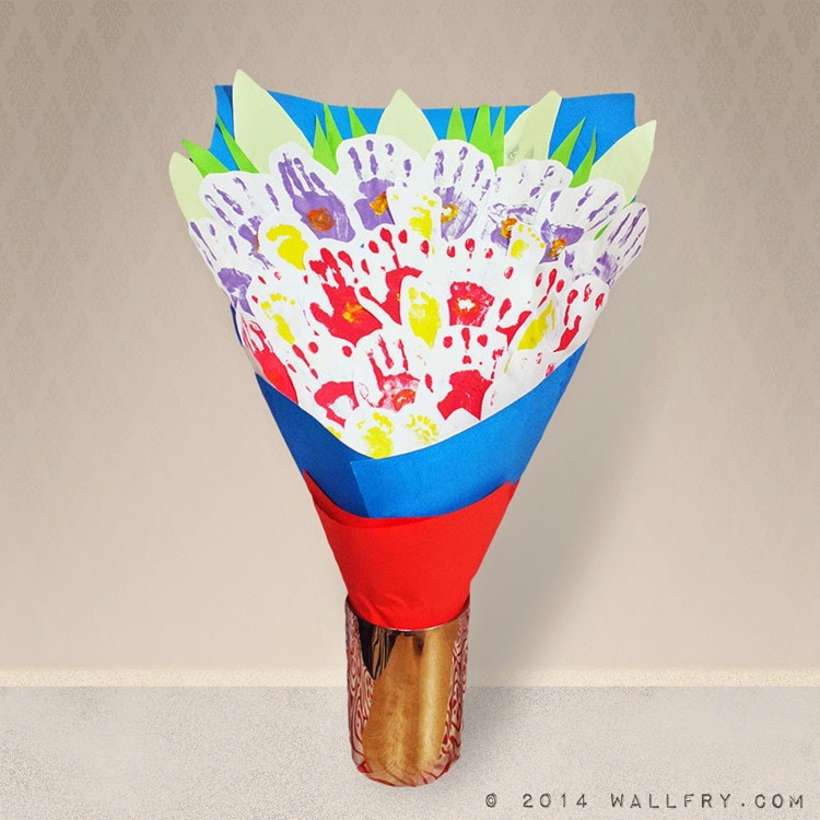 a homemade bouquet of handprints in a vase