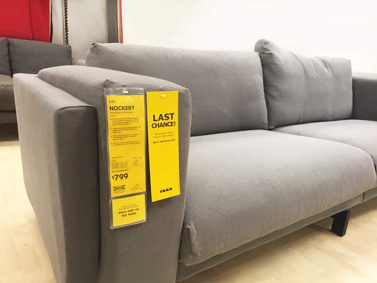 gray ikea nockeby sofa with yellow last chance price sticker