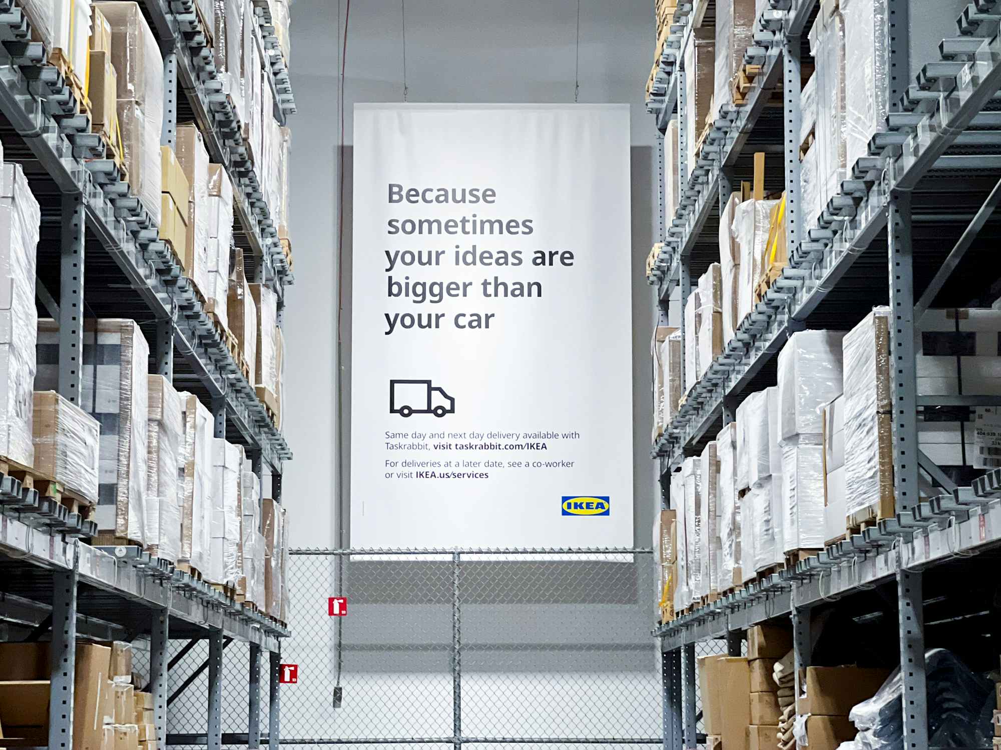 a sign in the warehouse of Ikea advertising the same day delivery service