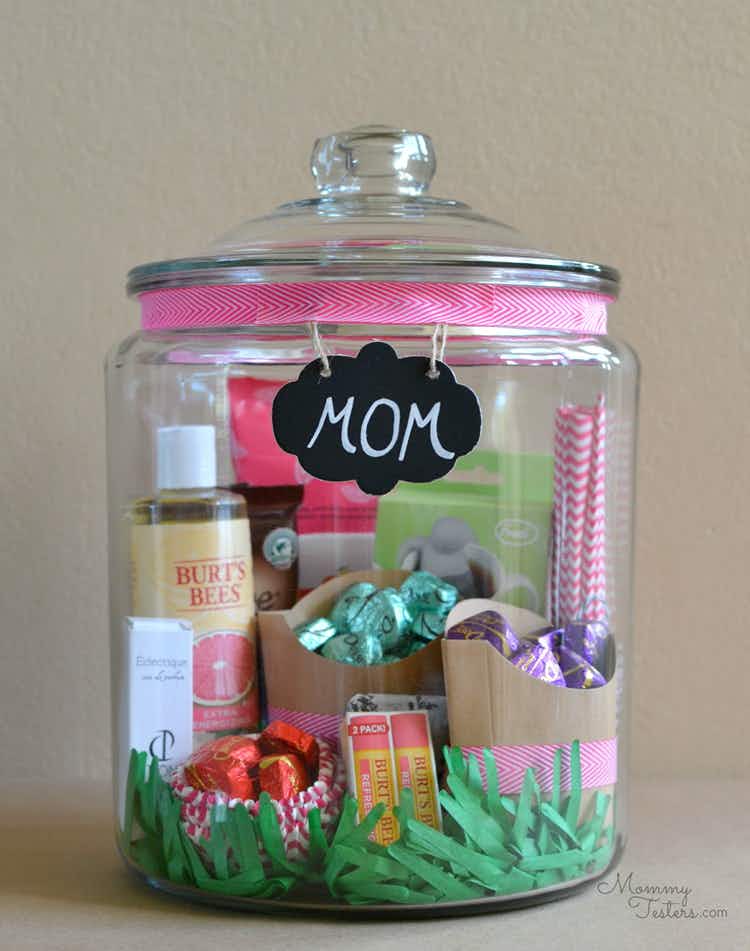 a large jar filled with chocolate and personal care items