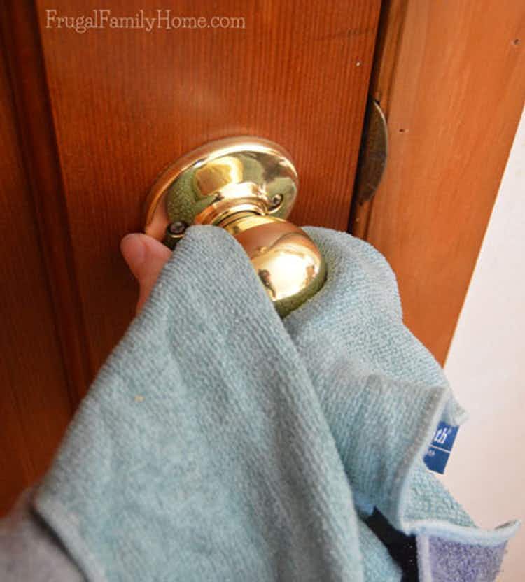 wiping-doorknobs