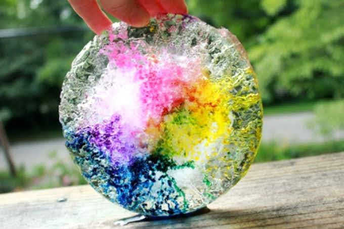 food coloring mixed in a puck of ice