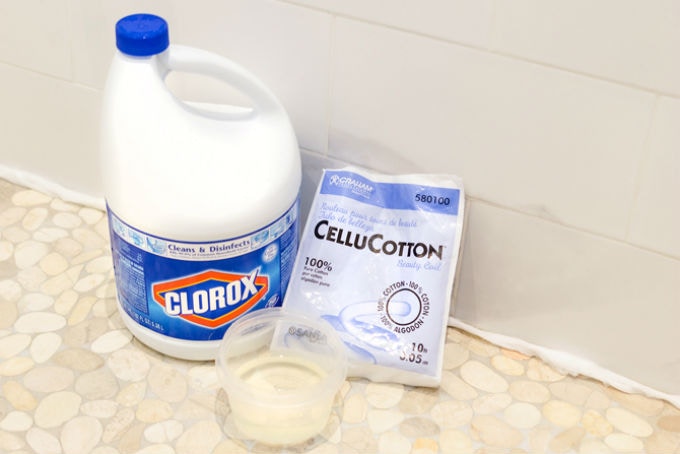 Remove bathtub mold with cotton coil soaked in bleach.
