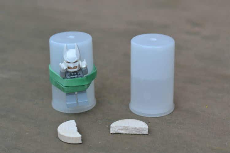 Construct a rocket with a lego batman and an Alka-Seltzer tablet inside a film canister on the ground