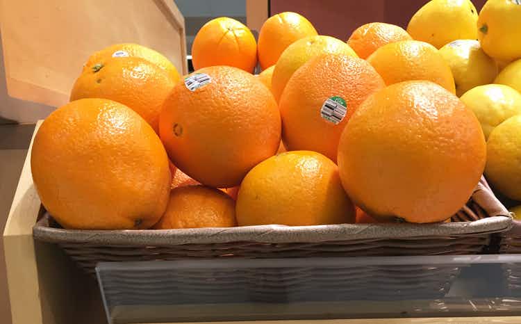 Oranges on display in a store