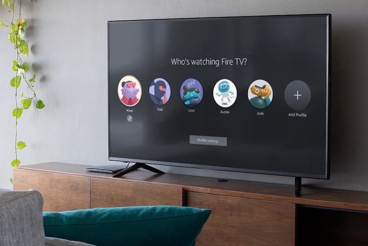 tv screen in living room showing various amazon prime video profiles