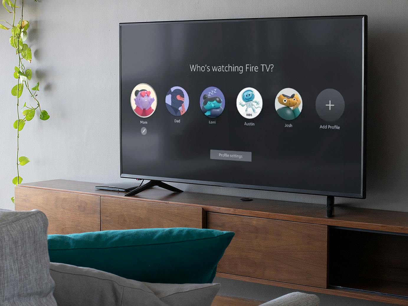 tv screen in living room showing various amazon prime video profiles