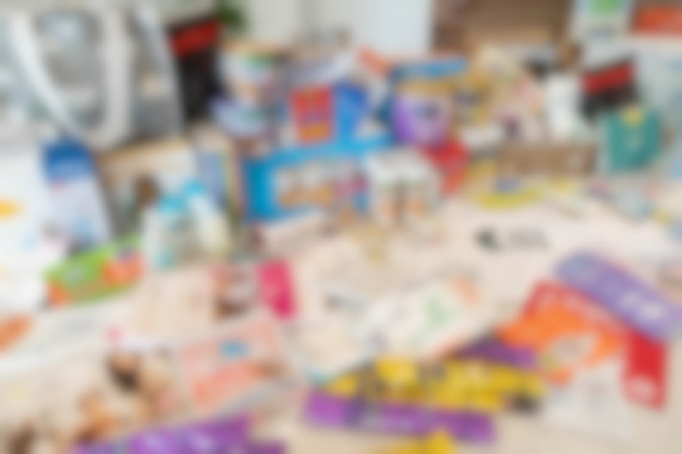 A large amount of baby products laid out on a counter top.
