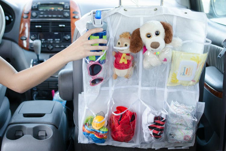 Keep toys, diapers, clothes and other road-trip essentials organized with a shoe organizer.