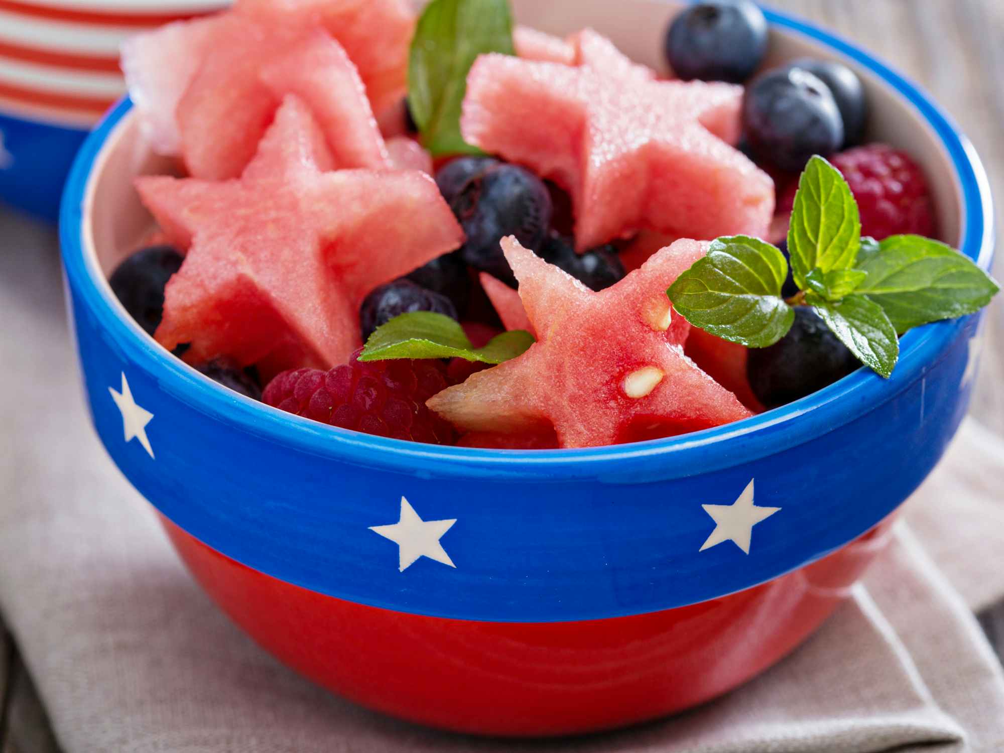 Fresh watermelon cut in star shape with blueberries