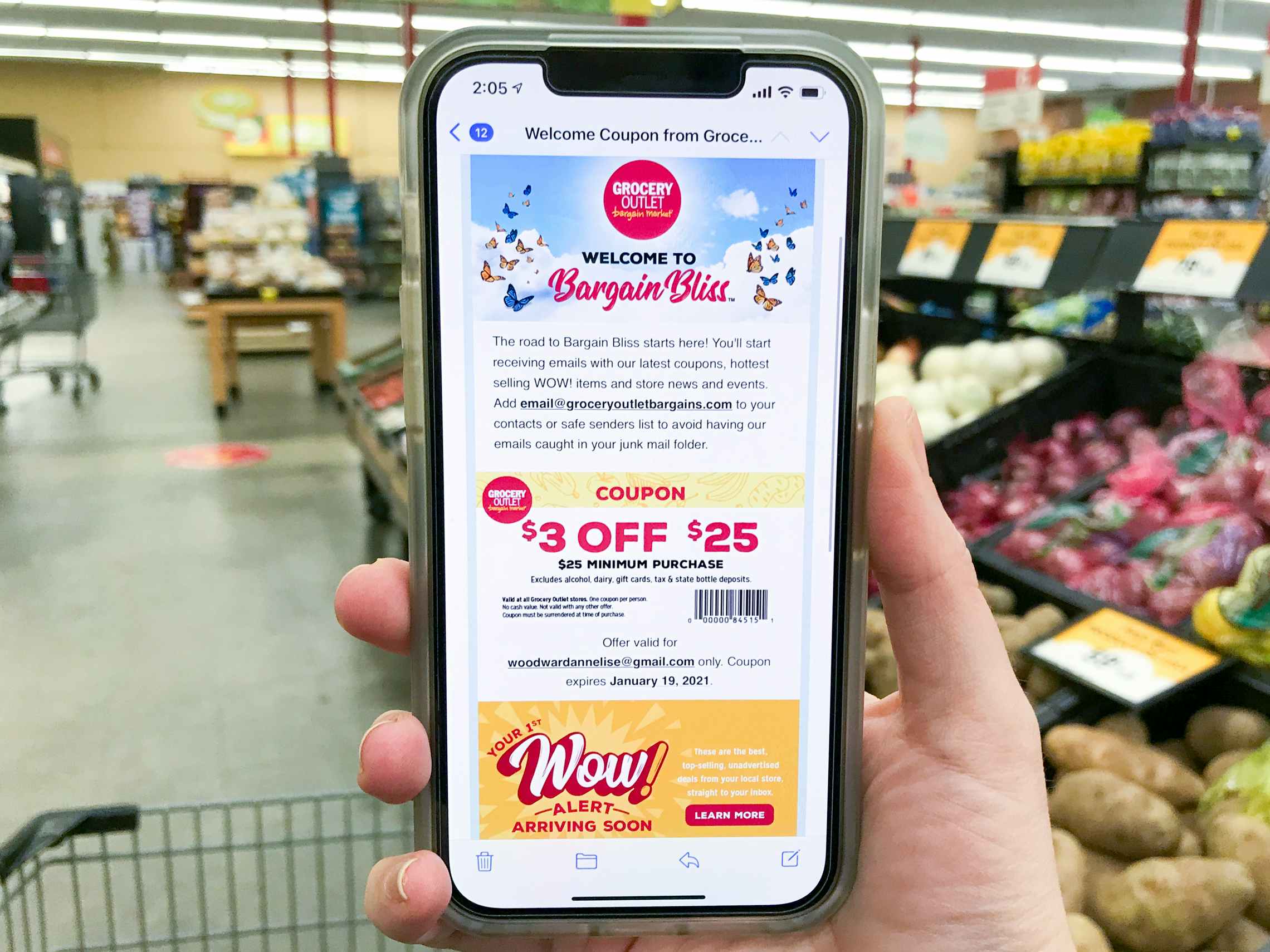 A Grocery Outlet sign up email on a cell phone.