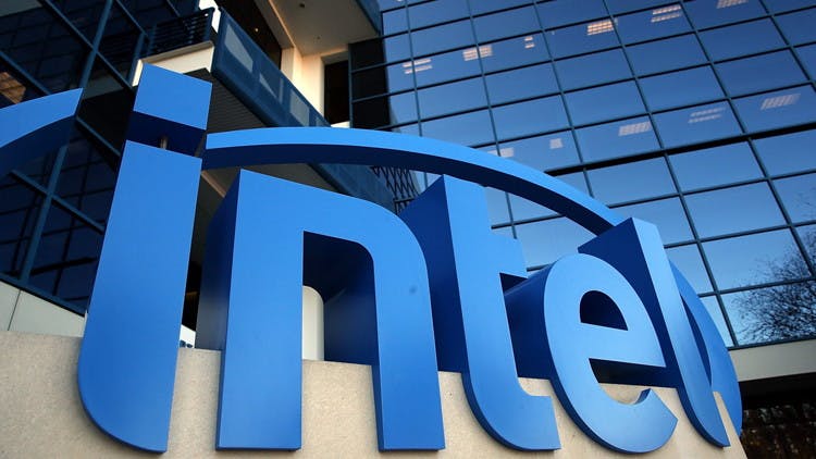 The Intel logo in front of one of their corporate buildings