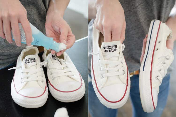 someone cleaning stains off white tennis shoes with nail polish remover.