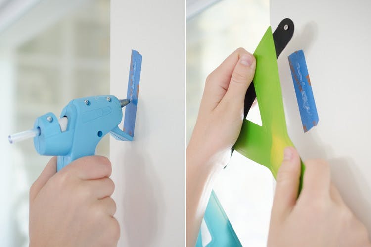 Use painter's tape and hot glue to hang cards and decorations without damaging the wall.