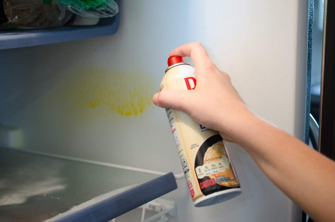 Defrost and prevent ice buildup in a freezer with cooking spray.