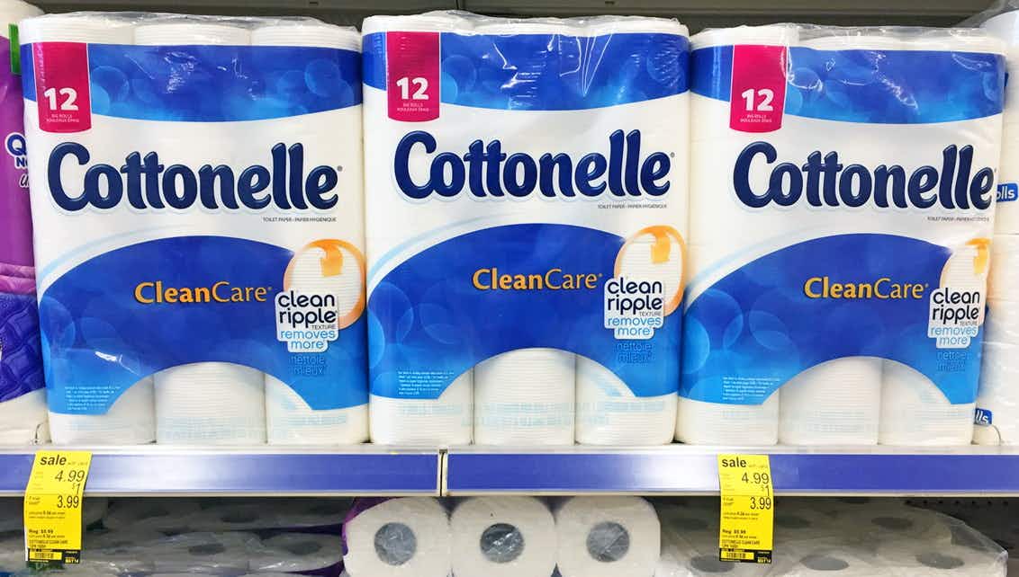 PAckages of Cottonelle toilet paper on store shelf in Walgreens.