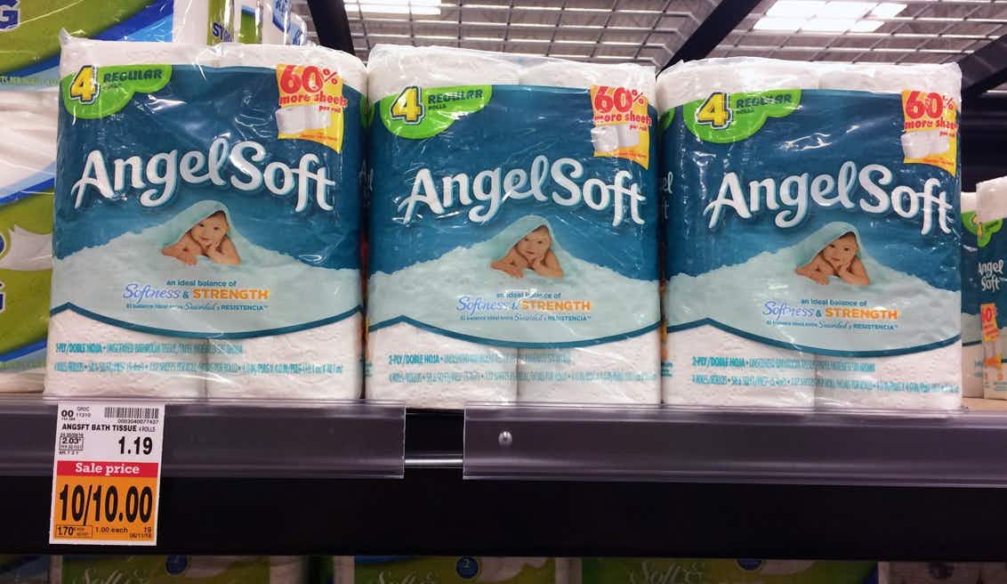 Packages of Angel Soft toilet paper on a store shelf.