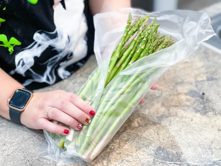 asparagus wrapped in plastic wrap