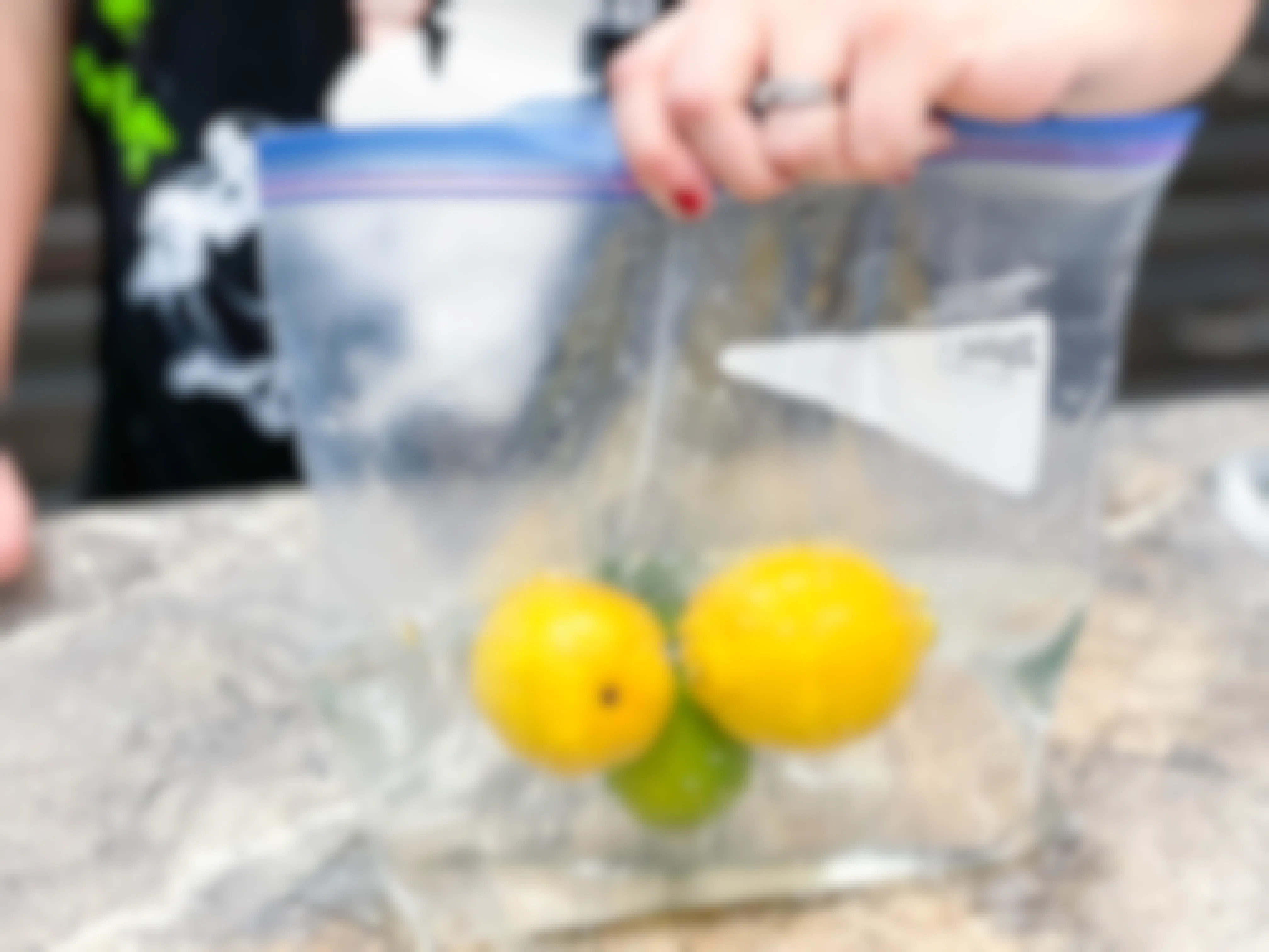 lemons and limes in a bag of water