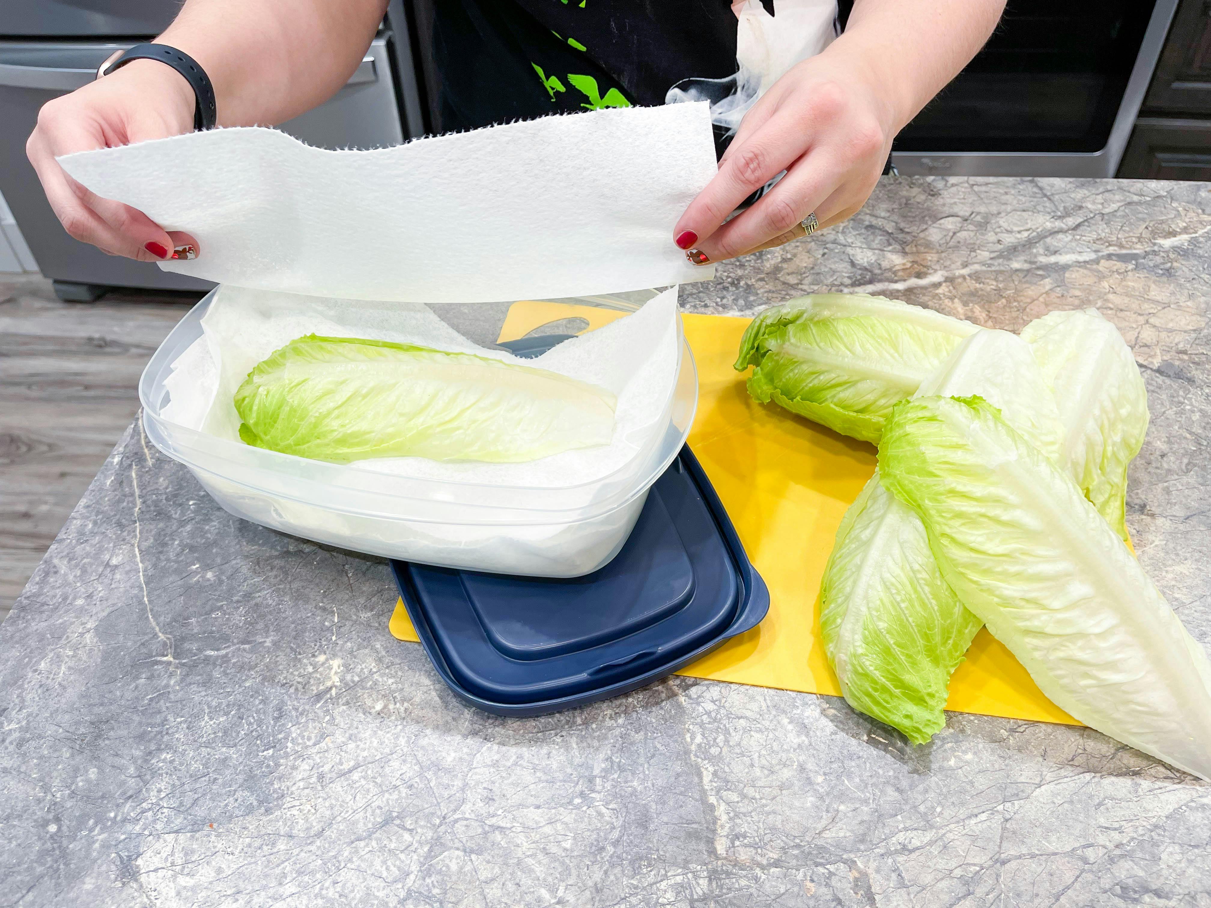 lettuce being separated with paper towel