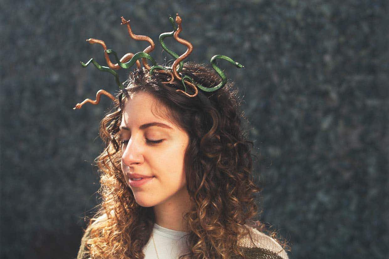 Glue or use wire to attach plastic snakes onto a headband and go as Medusa
