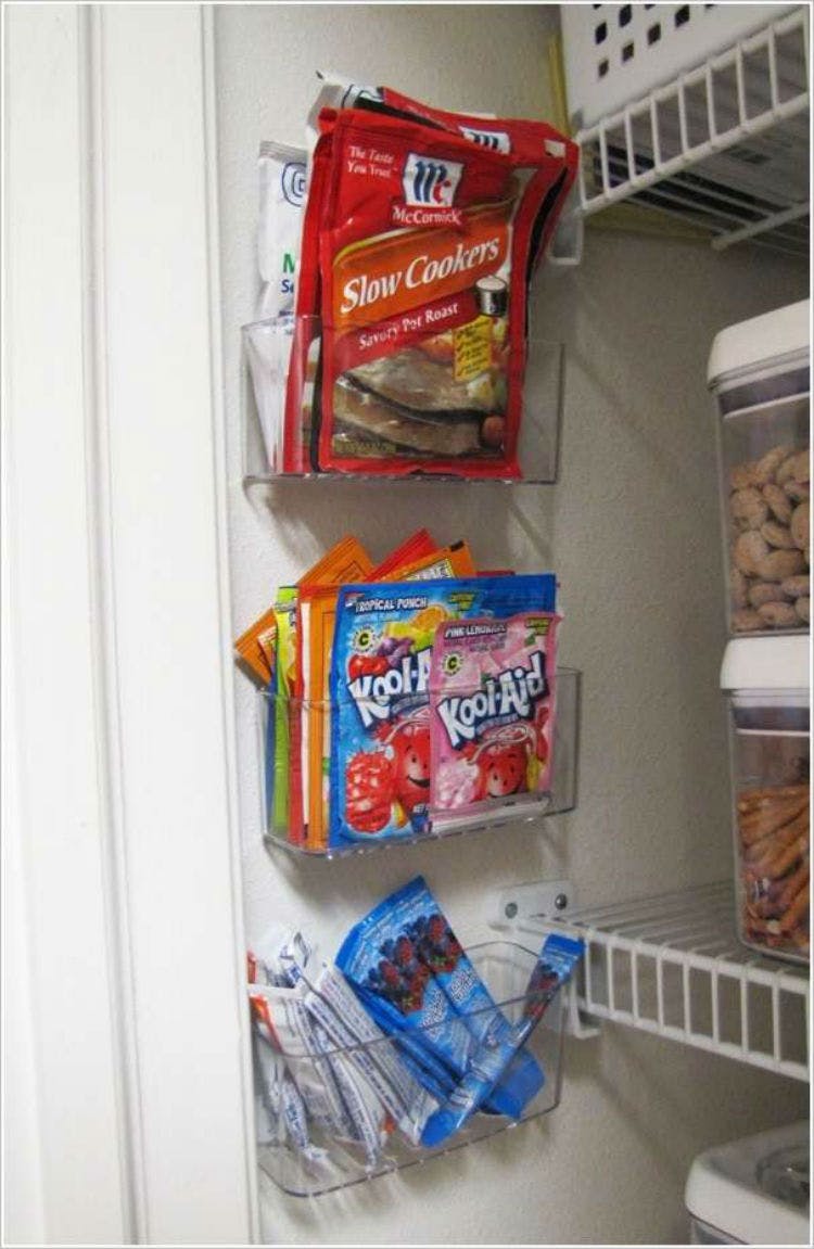 Attach sink caddies to empty spaces inside a cabinet.