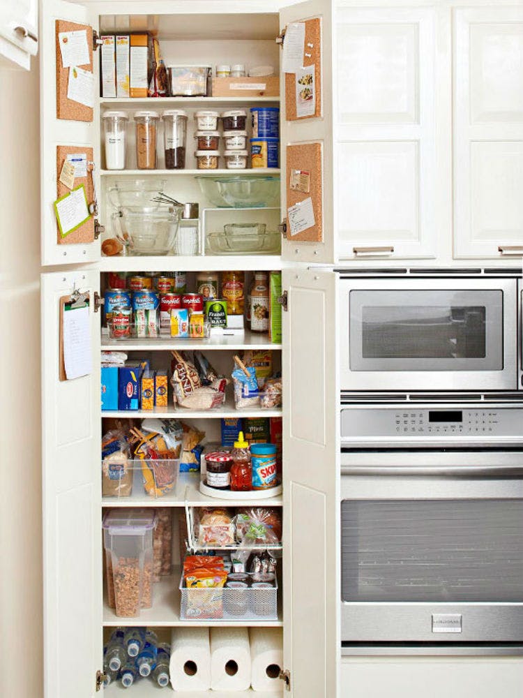 Attach cork to the interior of cabinets for recipes.