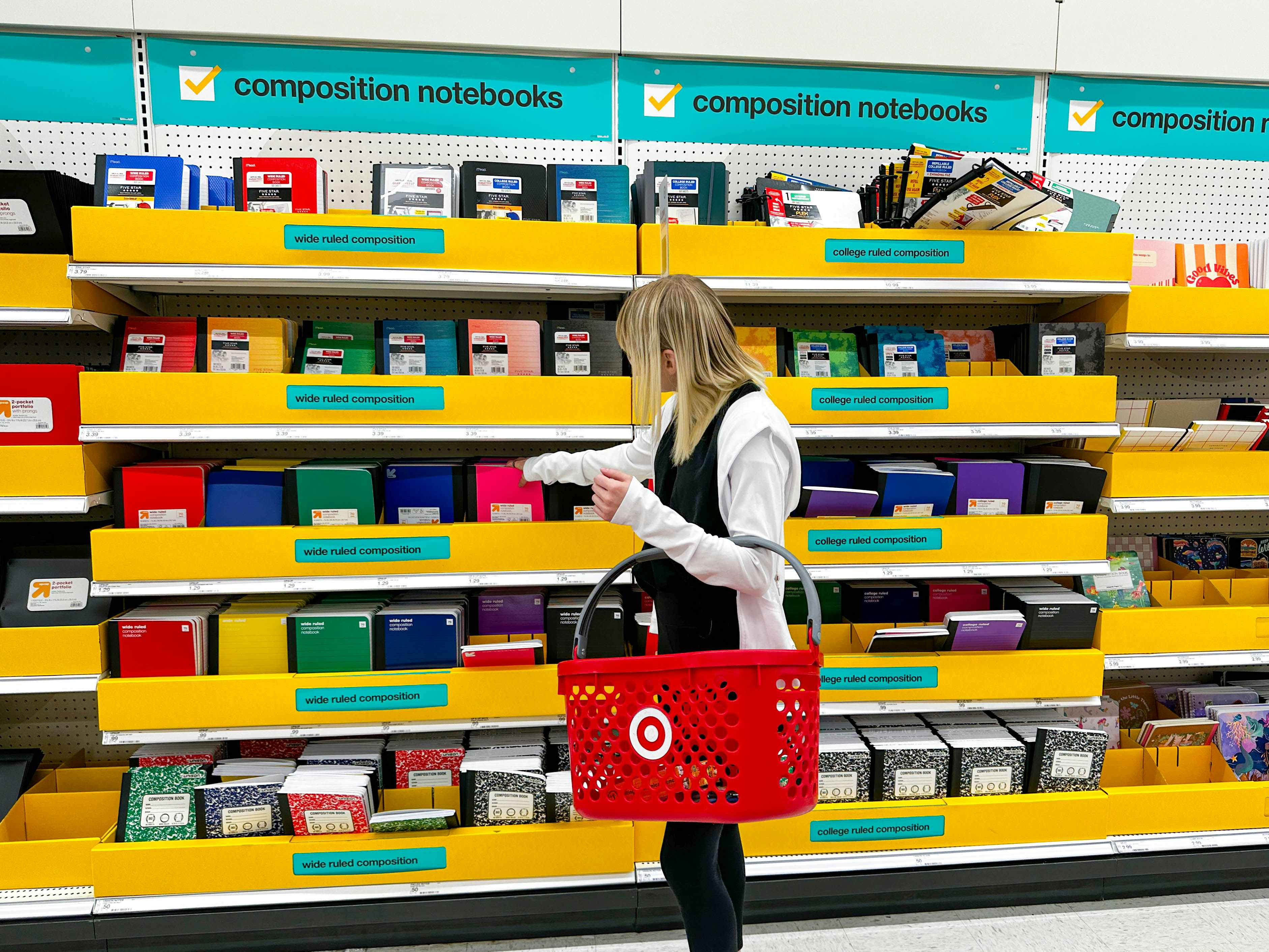 a college student shopping for school supplies in target