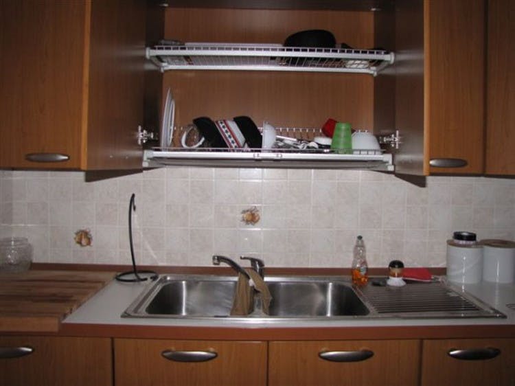 Add a built-in dish-drying rack over the sink.